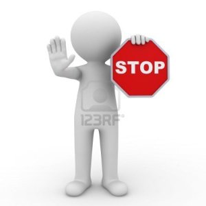 man-holding-stop-sign-on-white-background
